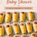 Table décorée avec des snacks variés pour une Baby Shower, incluant des mini-sandwiches et des cupcakes colorés.