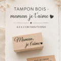 Tampon encreur sur une table avec le message 'Maman je t'aime'