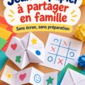 Un groupe d'enfants jouant à des jeux de papier et crayon en famille